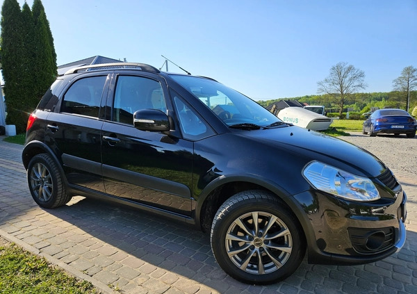 suzuki wielkopolskie Suzuki SX4 cena 36500 przebieg: 160000, rok produkcji 2011 z Poddębice